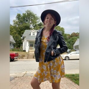 Yellow floral mini sun dress with elastic back in size small.